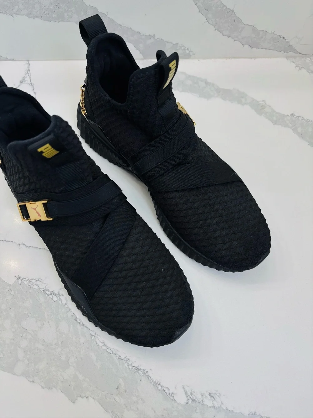 PUMA Women’s 10 Defy Mid Black Training Sneakers with Gold Buckle and Chain